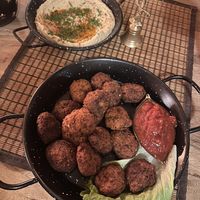 Hummus and quinoa and Sundried tomato fritters  at Veda House - Sofia in Sofia