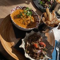 Vegan pumpkin stew with lentil salad and fries  at Stadscafé Flow in Den Helder