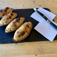 4 empanadas for 14 euros. i got two takitori and two dahl  at Toké Vieux in Lyon
