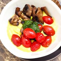 Hummus with tomatoes and mushrooms at Floresta Café in Porto