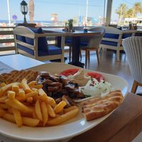 Gyros mushroom plate enjoyed with sea view at Maria's Golden Beach in Crete