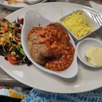 Jacket potato with vegan cheese, beans and salad at Mooch in Skegness