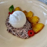 Dessert (Grilled pineapple, black rice pudding, Coconut ice cream)  at Sa Punta in Menorca