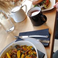 Lentil Dahl (carrots, zucchini and caramelised onions) and vegan bagel (quinoa) with oven baked potatoes and salad. at La Parenthèse in Dinard