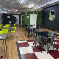 Inside seating w/ bar area seating also  at Cocina Plantosaurus in Charles Town