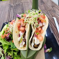 Impossible black bean tacos w/ pico and garlic crema 😋 at Cocina Plantosaurus in Charles Town