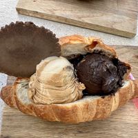 Salted caramel and chocolate ice cream in a croissant   at Fabrika in Tirana