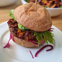 Veggie Burger with Coconut Bacon, Slaw, Chipotle Sauce at The Grounds Cafe in Portugal Cove-st Philips