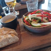 Vegan curry with rice and bread at Beachclub Lekker in Vrouwenpolder