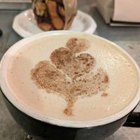 Oat dirty chai with vegan chocolate espresso glazed knot at Lit Coffee Roastery & Bakeshop in Bethlehem