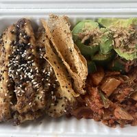 Peanut-sauce Tofu Rice Bowl, Avocado & Cucumber Salad, and Vegan Kim Chi  at Dinky Dau in Bend