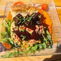 Foccacia with houmous and beetroot. Pepper sauce. Cashew. Leaves. at Mormors Cafe in Fredrikstad