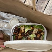 “I am dazzling” + tempeh! The lettuce was not cut. Small dressing on the side and the lettuce was brown! I can’t believe I paid $23.50 for this garbage!   at Cafe Gratitude in Newport Beach