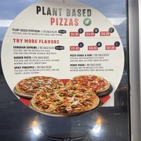 Sign for Vegan Pizzas  at New Orleans Pizza in Guelph