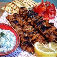 Handmade vegan souvlaki with soya, served with vegan traditional tzatziki, Greek pitta, lemon & fresh tomatoes! at W Karytsi in Athens