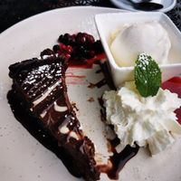 Vegan choc cake (moved to the side away from my partners non vegan cream and ice cream!)  at Guy's Bar in Clifden