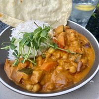 Vegan curry with rice, chickpeas, sweet potato and papadum.  at Guy's Bar in Clifden