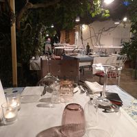 Outdoor tables at Il Bivio Trattoria da Fedio in Ampio