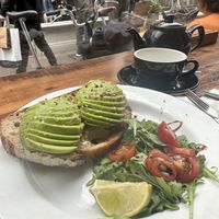 vegan avo brunch (avocado, sourdough ,tomato)   at Uncommon Ground Coffee Roastery in Cardiff