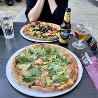Pizzas from front to back: a vegan speciale and the vegan verde. 🍕  at Pizzeria Di Stefano in Groningen