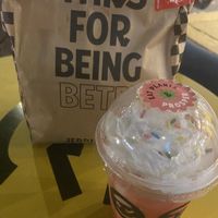 Strawberry shake and takeout bag at Jerrell's Betr Brgr in New York City