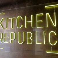 Logo at entrance at Kitchen Republic in Basel