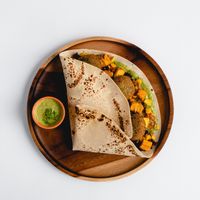 Sánduche Champeta (Falafel, hogao, maíz tierno, plátano maduro, lechuga morada, mayonesa de cilantro en pan servilleta) at La Lleva in Bogota