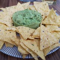 nachos guacamole very basic at Café Con Libros in Malaga