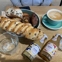 Breakfast for three - coffee, juices, and a greedily chosen bowl of pastries!   at Land & Monkeys - Turenne in Paris
