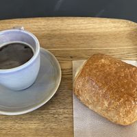 Pain au chocolat et café   at Land & Monkeys - Turenne in Paris