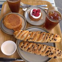 Viennoise au chocolat, breakfast muffin, raspberry tart, iced Americanos at Land & Monkeys - Turenne in Paris