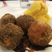 Cinnamon donuts with chocolate sauce and mango sorbet at Wok in the Park in St Louis Park
