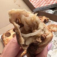 Snausage roll with onions   at Attilio's Pizzeria in Toms River