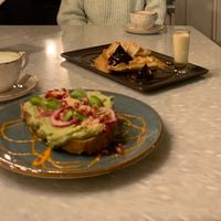 All vegan food, little menu but very yummy! The waffle was incredible 🤤 The atmosphere is very lovely and cozy! I will recommend it for sure!    at FINT Kafé & Bar in Tromsoe