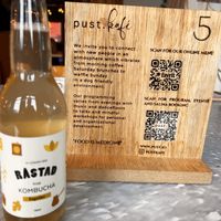 Kombucha and QR codes for menu and sauna  at FINT Kafé & Bar in Tromsoe