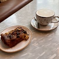Vegan blondie with peanut butter and chocolate chunks, cappuccino with alpro almond milk   at FINT Kafé & Bar in Tromsoe