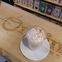 Hazelnut latte with soy whipped cream at Origines Tea And Coffee in Annecy-le-vieux