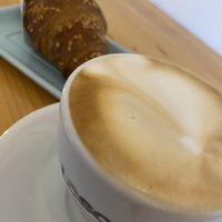 Hemp croissant with orange and flax jam and almond cappuccino   at Cucineria L'Ortica Dolce in Sinalunga