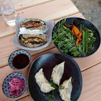 veggie gyoza, mushroom onigirazu (rice nori wrap), and local veggies (part of veggie noodles not pictured, omit egg) at Setsunai Noodle Bar in Lopez Island