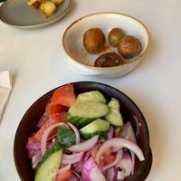 Cucumber tomato salad and Yukons  at Casa Del Cabo in Eastham