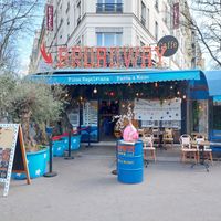Restaurant located at a street corner at Broadway Caffe in Paris