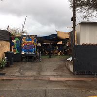 La entrada del lugar donde se encuentra  at Mattre Pizza  in Santiago