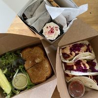 Take out from Garden Grille and Wildflour! Korean Tacos and Reuben with side of greens.  at Garden Grille Cafe in Pawtucket