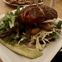 Fried oyster mushroom sandwich on pretzel bunn  at Garden Grille Cafe in Pawtucket