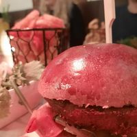 Falafel burger with twister fries and a side salad at Swing in Gouda