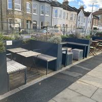 Outdoor seating with no table service   at Bonjour Brioche Cafe in South West London