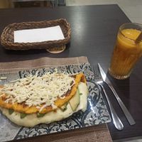 Cachapota vegana y zumo de maracuyá at Mango Con Sal - Tarragona in Tarragona