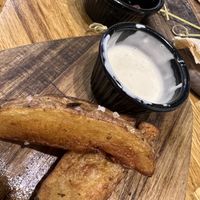 Huge Wedges with Vegan Garlic Aioli. (There we’re lots more than this!)  at Secret Garden in Newquay