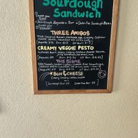 The Cultured Sourdough sandwich menu: a choice of sourdough baguette, sourdough bun, or gluten free sourdough bun, and various filling options. at It's Alive Bakery & Fermentory in Rodney Bay