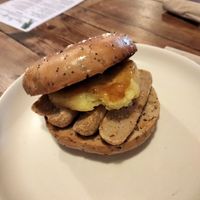 Vegan sausage & hash brown bagel. at Happy Bean in Southampton